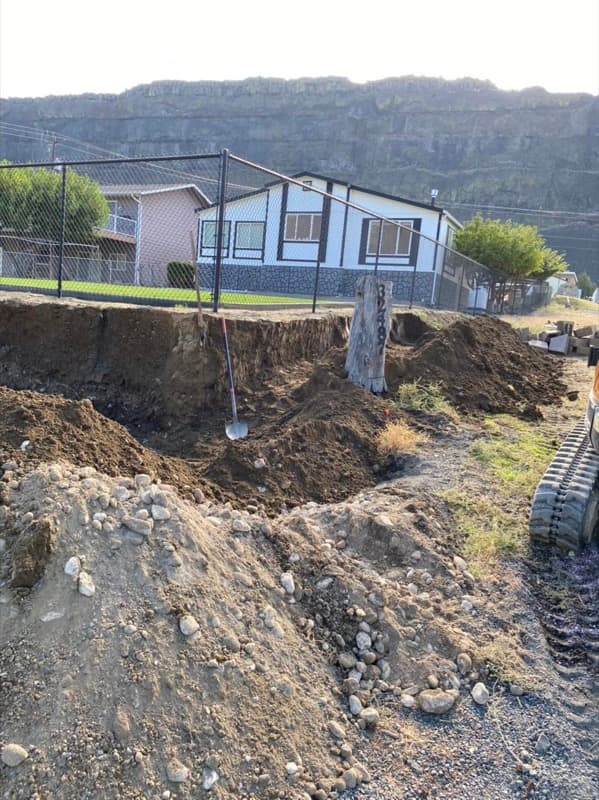 Hillside excavated for a retaining wall, before construction