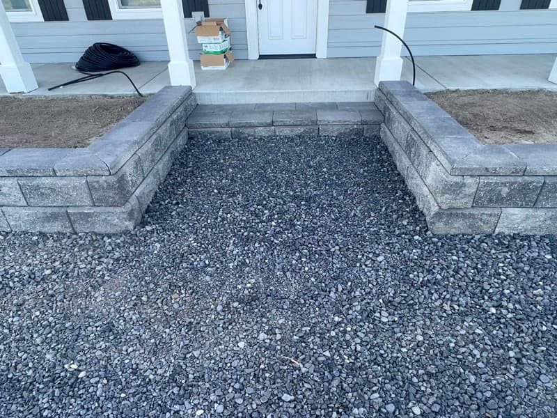 Block planter walls along a home's front porch